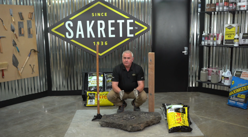 Sakrete Employee using Sakrete products